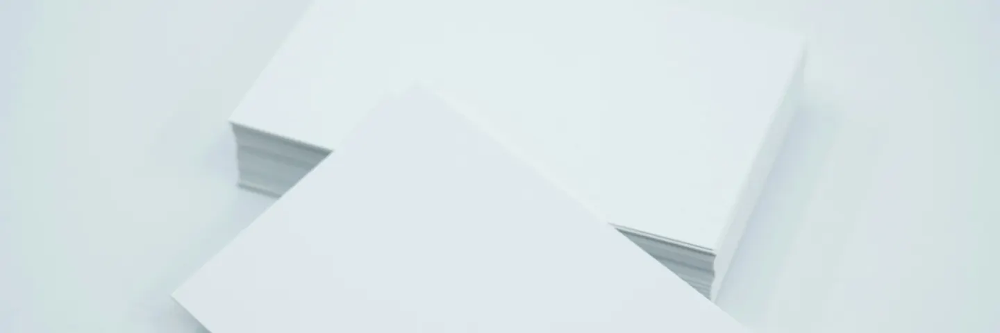 Blank white card stock on a white background